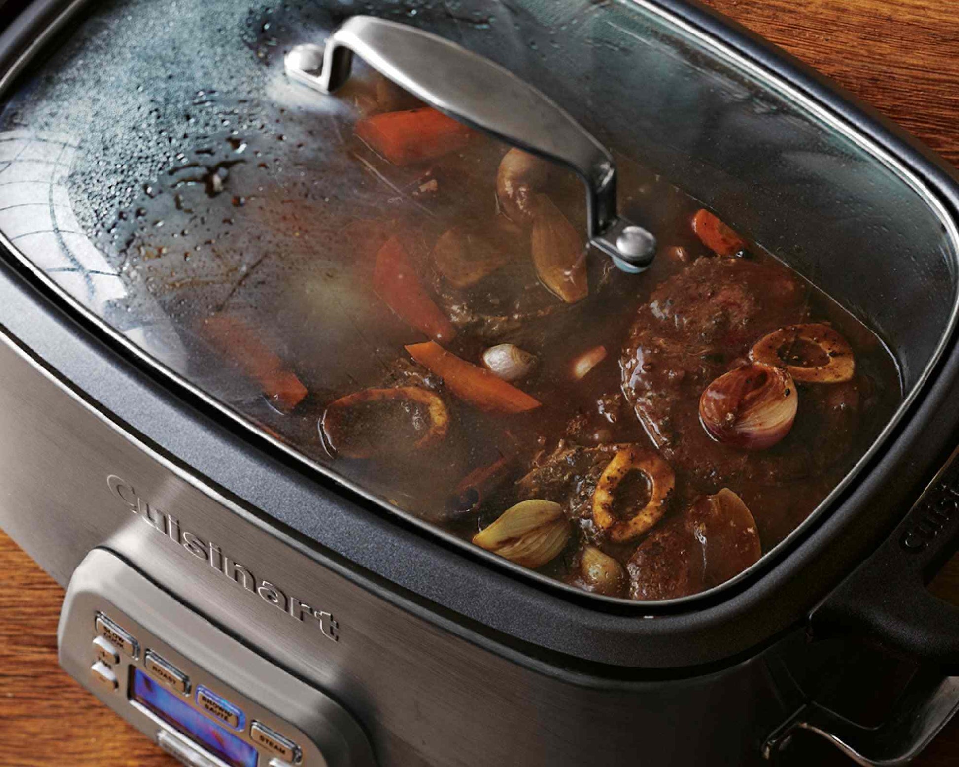 Cuisinart MSC-800 7-quart stainless steel multicooker with programmable slow cook, roast, sauté, and steam functions and blue backlit LCD display