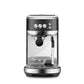 Breville Bambino Plus espresso machine in brushed stainless steel with compact design and automatic microfoam texturing