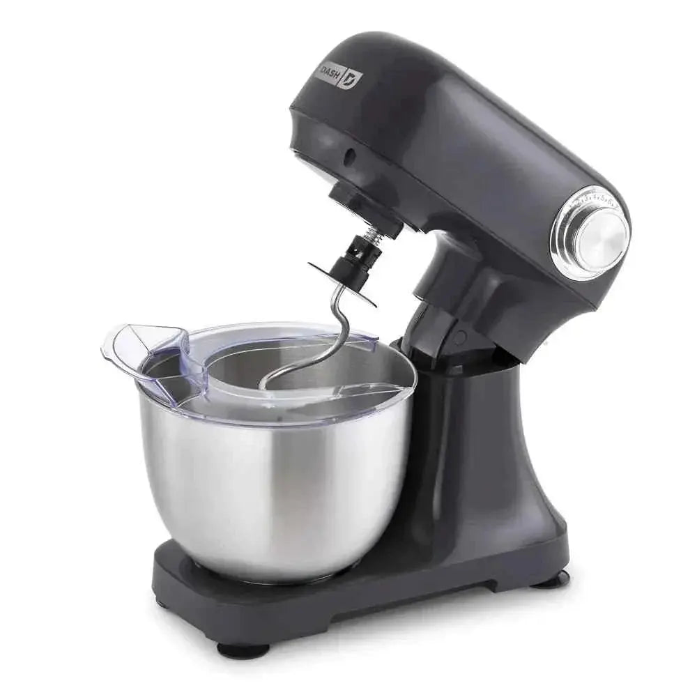 Dash Tilt Head 3.5qt 12-Speed Stand Mixer in cream with stainless steel bowl and three attachments