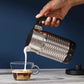 Nespresso Aeroccino 4 silver electric milk frother with ergonomic handle and sleek design on countertop