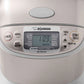 Zojirushi NS-TSC10 Micom rice cooker with fuzzy logic, multiple settings, steaming basket, and LCD display