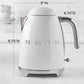 SMEG Electric Kettle with 360° swivel base, auto-shutoff, water-level indicators, gentle steam release, and removable limescale filter
