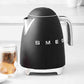 SMEG Electric Kettle with 360˚ swivel base, auto-shutoff, water-level indicators, steam-release lid, and removable limescale filter